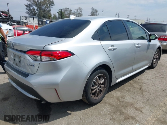 2022 Toyota Corolla Hybrid LE with VIN JTDEAMDE6NJ056705, listed as a IAAI auction lot 42032119 with 197,030 mi miles. Bid and sale history available at carsss.com. Image 4.