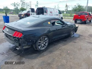 2015 Ford Mustang EcoBoost with VIN 1FA6P8TH5F5374241, listed as a IAAI auction lot 42556786 with 140,017 mi miles and . Bid and sale history available at DreamBid. Image 4.