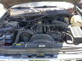 1996 Jeep Grand Cherokee Laredo with VIN 1J4GZ58S7TC280276, listed as a IAAI auction lot 42120454 with 230,617 mi miles. Bid and sale history available at carsss.com. Image 10.