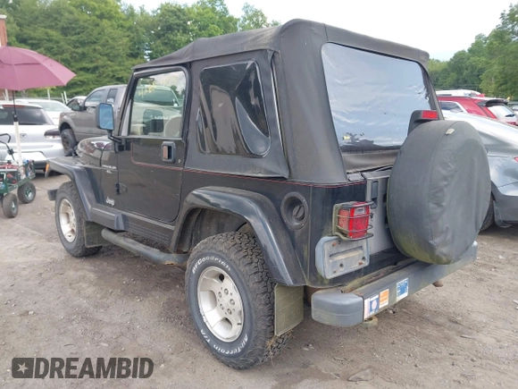 2001 Jeep Wrangler Sahara with VIN 1J4FA59S41P358035, listed as a IAAI auction lot 42685488 with 120,630 mi miles and . Bid and sale history available at DreamBid. Image 3.
