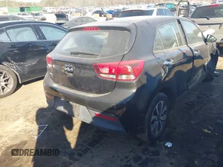 2022 Kia Rio S with VIN 3KPA25AD8NE443590, listed as a IAAI auction lot 41684325 with 73,231 mi miles and . Bid and sale history available at DreamBid. Image 4.