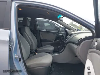2014 Hyundai Accent GS with VIN KMHCT5AE1EU147015, listed as a IAAI auction lot 41659497 with 147,832 mi miles. Bid and sale history available at carsss.com. Image 5.