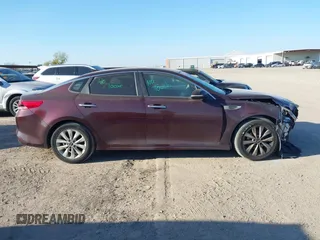 2016 Kia Optima LX z VIN 5XXGT4L36GG001942, wystawiony jako IAAI lot #41236894 z przebiegiem 125 376 mil mil oraz . Historia ofert i sprzedaży dostępna na DreamBid. Obrazek 13.