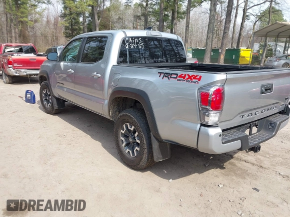 2022 Toyota Tacoma SR with VIN 3TMCZ5ANXNM497511, listed as a IAAI auction lot 41670710 with 26,277 mi miles and . Bid and sale history available at DreamBid. Image 3.
