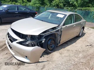 2014 Lexus ES 300h with VIN JTHBW1GG5E2047180, listed as a IAAI auction lot 42395421 with 103,262 mi miles and . Bid and sale history available at DreamBid. Image 6.
