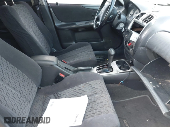 2002 Mazda Protege with VIN JM1BJ245921455563, listed as a IAAI auction lot 42064853 with Not Provided miles and . Bid and sale history available at DreamBid. Image 5.
