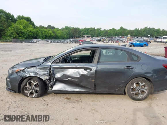 2021 Kia Forte LXS with VIN 3KPF24AD9ME347076, listed as a IAAI auction lot 42289157 with 59,095 mi miles and . Bid and sale history available at DreamBid. Image 13.