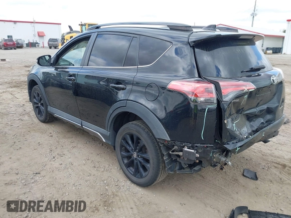 2018 Toyota RAV4 XLE with VIN 2T3RFREV1JW697044, listed as a IAAI auction lot 41891412 with 140,145 mi miles. Bid and sale history available at carsss.com. Image 3.