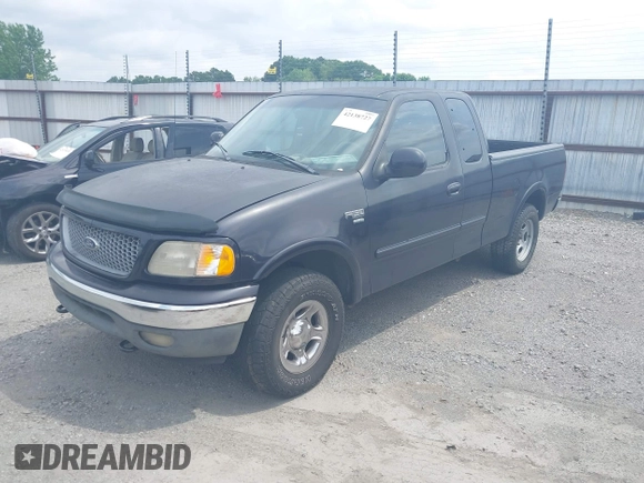1999 Ford F-150 XL with VIN 1FTRX18L3XNA05021, listed as a IAAI auction lot 42138727 with 1 mi miles. Bid and sale history available at carsss.com. Image 2.