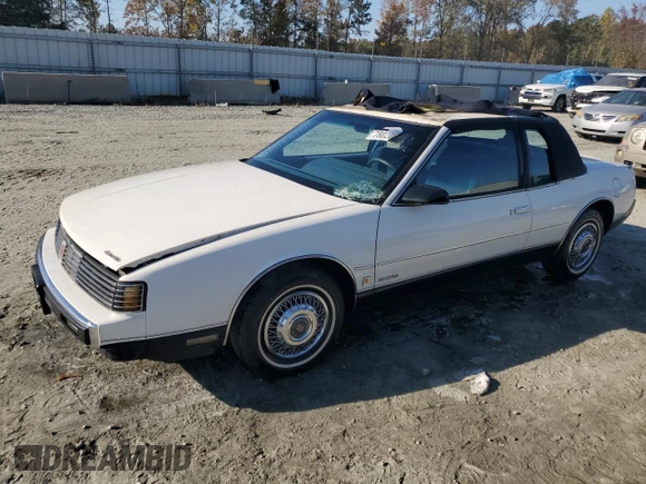 1987 Oldsmobile Toronado with VIN 1G3EZ1130HU307201, listed as a Copart auction lot 78028584 with 104,837 mi miles and Salvage Title. Bid and sale history available at DreamBid. Image 1.