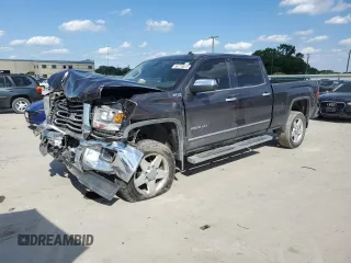 2015 GMC Sierra 2500HD SLT с VIN 1GT12ZEGXFF124081, выставлен на аукционе Copart как лот 56778875 с пробегом 142 223 миль миль и Списание • Salvage title. История ставок и продаж доступна на DreamBid. Изображение 1.