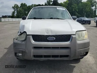 2002 Ford Escape XLT Choice with VIN 1FMYU04172KA40489, listed as a Copart auction lot 58437165 with 212,793 mi miles and Salvage title. Bid and sale history available at DreamBid. Image 5.