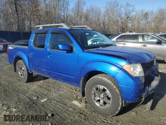 2015 Nissan Frontier Pro-4X with VIN 1N6AD0EVXFN744419, listed as a Copart auction lot 42835395 with 77,691 mi miles and Salvage title. Bid and sale history available at DreamBid. Image 4.