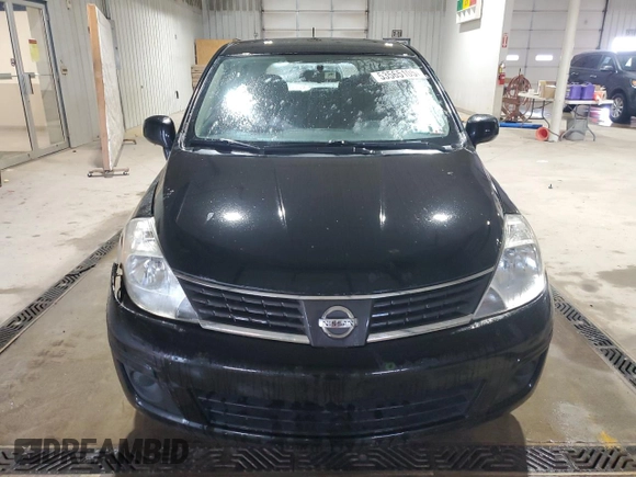 2007 Nissan Versa 1.8 S with VIN 3N1BC13E87L409263, listed as a Copart auction lot 53565105 with 124,860 mi miles and Salvage Title. Bid and sale history available at carsss.com. Image 5.