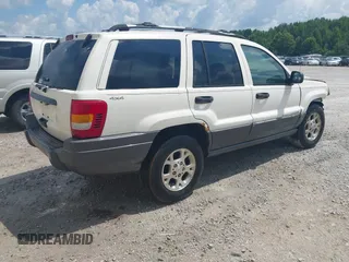 2001 Jeep Grand Cherokee Laredo with VIN 1J4GW48S81C520385, listed as a IAAI auction lot 42790086 with 190,617 mi miles and . Bid and sale history available at DreamBid. Image 4.