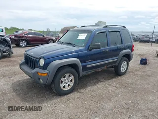 2002 Jeep Liberty Sport with VIN 1J4GL48K42W260513, listed as a IAAI auction lot 42163192 with 146,789 mi miles. Bid and sale history available at carsss.com. Image 2.