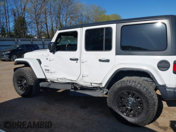 2019 Jeep Wrangler Unlimited Sahara with VIN 1C4HJXEN2KW591557, listed as a IAAI auction lot 41962034 with 88,691 mi miles and . Bid and sale history available at DreamBid. Image 14.