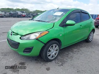 2012 Mazda 2 Sport with VIN JM1DE1KY5C0144238, listed as a IAAI auction lot 42073776 with 55,181 mi miles. Bid and sale history available at carsss.com. Image 2.