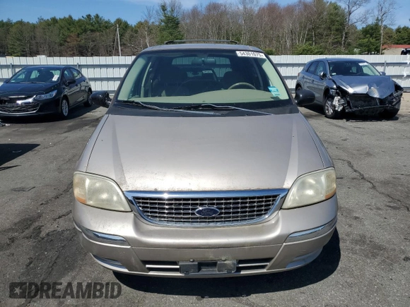 2003 Ford Windstar SE z VIN 2FMDA52473BB10747, wystawiony jako Copart lot #54301075 z przebiegiem 74 513 mil mil oraz Czysty tytuł • Clean title. Historia ofert i sprzedaży dostępna na DreamBid. Obrazek 5.