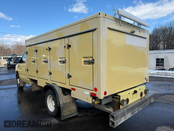 2021 Ford Econoline Cargo with VIN 1FDXE4FN2MDC34418, listed as a Copart auction lot 47252055 with 88,788 mi miles and Clean Title. Bid and sale history available at DreamBid. Image 2.