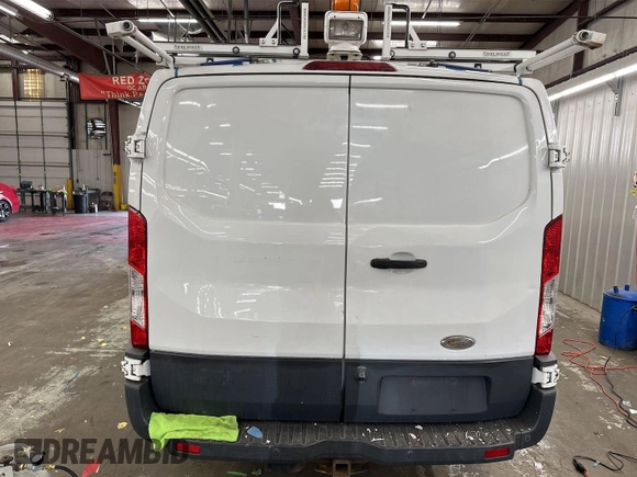 2015 Ford Transit Cargo with VIN 1FTNR1ZM2FKA45204, listed as a IAAI auction lot 42304858 with 137,661 mi miles and . Bid and sale history available at DreamBid. Image 1.