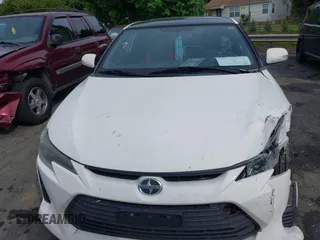 2014 Scion tC z VIN JTKJF5C77E3082073, wystawiony jako IAAI lot #42107615 z przebiegiem 223 895 mil mil oraz . Historia ofert i sprzedaży dostępna na DreamBid. Obrazek 12.