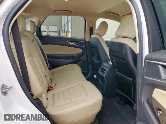2020 Ford Edge SEL с VIN 2FMPK3J93LBB16928, выставлен на аукционе Copart как лот 63030385 с пробегом 81 567 миль миль и Чистый • Clean title. История ставок и продаж доступна на DreamBid. Изображение 10.