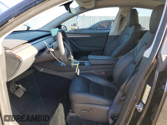2024 Tesla Model Y with VIN 7SAYGDED3RF151031, listed as a Copart auction lot 49494165 with 7,503 mi miles and Salvage Title. Bid and sale history available at DreamBid. Image 7.