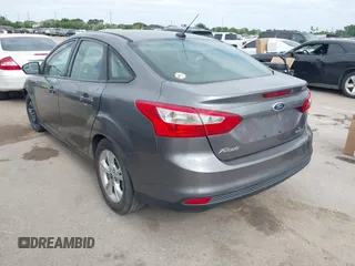 2014 Ford Focus SE with VIN 1FADP3F27EL139920, listed as a IAAI auction lot 42024617 with 143,223 mi miles and . Bid and sale history available at DreamBid. Image 3.