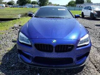 2016 BMW M6 z VIN WBS6E9C56GGF92508, wystawiony jako Copart lot #66958344 z przebiegiem Nie podano mil oraz Szkoda całkowita • Salvage title. Historia ofert i sprzedaży dostępna na DreamBid. Obrazek 5.