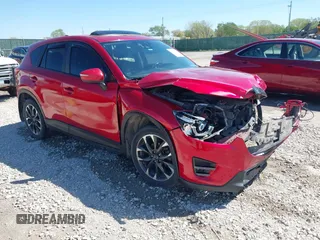 2016 Mazda CX-5 Grand Touring with VIN JM3KE2DYXG0652017, listed as a IAAI auction lot 42041158 with 95,946 mi miles and . Bid and sale history available at carsss.com. Image 1.