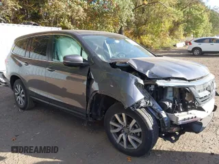 2020 Honda Pilot EX-L z VIN 5FNYF6H53LB069677, wystawiony jako IAAI lot #40581586 z przebiegiem 21 717 mil mil oraz . Historia ofert i sprzedaży dostępna na DreamBid. Obrazek 1.