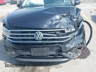 2022 Volkswagen Tiguan SE with VIN 3VV2B7AX0NM146315, listed as a IAAI auction lot 42512975 with 40,577 mi miles and . Bid and sale history available at DreamBid. Image 6.
