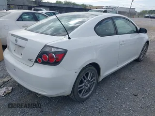 2010 Scion tC with VIN JTKDE3B79A0313508, listed as a IAAI auction lot 41970517 with 163,604 mi miles. Bid and sale history available at carsss.com. Image 4.