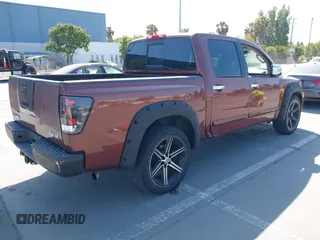 2004 Nissan Titan LE z VIN 1N6AA07A84N514538, wystawiony jako IAAI lot #42396385 z przebiegiem 214 783 mil mil oraz . Historia ofert i sprzedaży dostępna na DreamBid. Obrazek 4.