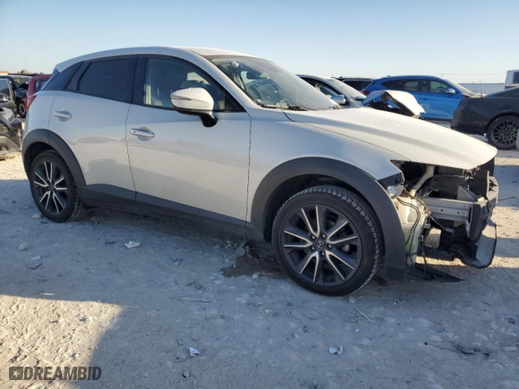 2018 Mazda CX-3 Touring with VIN JM1DKDC77J0329677, listed as a Copart auction lot 46796955 with 208,609 mi miles and Salvage Title. Bid and sale history available at carsss.com. Image 4.