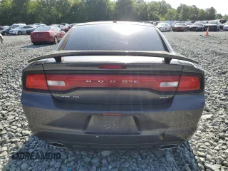 2014 Dodge Charger SXT z VIN 2C3CDXHG1EH315764, wystawiony jako Copart lot #57605135 z przebiegiem 273 912 mil mil oraz Szkoda całkowita • Salvage title. Historia ofert i sprzedaży dostępna na DreamBid. Obrazek 6.