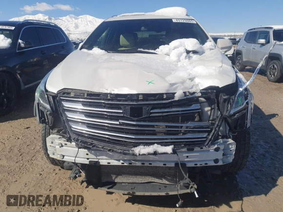 2019 Cadillac XT5 Premium Luxury AWD z VIN 1GYKNFRS5KZ252885, wystawiony jako Copart lot #49729865 z przebiegiem 54 593 mil mil oraz Szkoda całkowita • Salvage title. Historia ofert i sprzedaży dostępna na DreamBid. Obrazek 5.