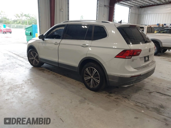 2019 Volkswagen Tiguan SE with VIN 3VV3B7AX9KM030028, listed as a IAAI auction lot 40445099 with 85,400 mi miles and . Bid and sale history available at DreamBid. Image 3.
