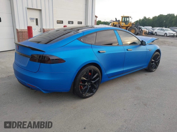 2013 Tesla Model S Performance with VIN 5YJSA1DP5DFP25345, listed as a IAAI auction lot 42288379 with 165,915 mi miles and . Bid and sale history available at DreamBid. Image 4.