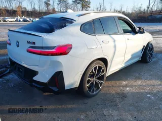 2022 BMW X4 M with VIN 5YM23EC00N9L88771, listed as a IAAI auction lot 41362198 with 29,949 mi miles. Bid and sale history available at carsss.com. Image 4.