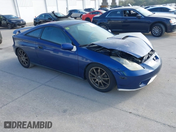2002 Toyota Celica GT with VIN JTDDR32T220113449, listed as a IAAI auction lot 41546615 with 247,392 mi miles. Bid and sale history available at carsss.com. Image 1.