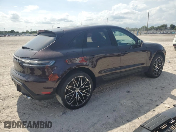2024 Porsche Macan with VIN WP1AA2A53RLB14849, listed as a Copart auction lot 57979155 with 10,031 mi miles and Salvage title. Bid and sale history available at DreamBid. Image 3.