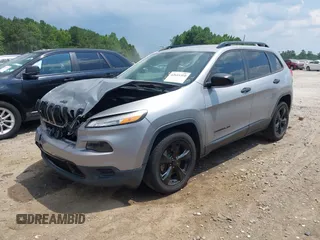 2016 Jeep Cherokee Altitude with VIN 1C4PJLAB7GW307900, listed as a IAAI auction lot 42611390 with 130,123 mi miles and . Bid and sale history available at DreamBid. Image 23.