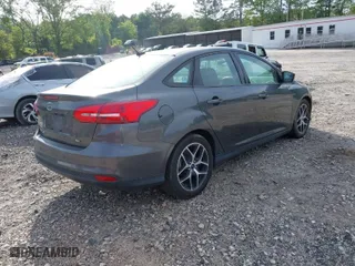 2017 Ford Focus SEL with VIN 1FADP3H22HL305908, listed as a IAAI auction lot 42084489 with 94,757 mi miles. Bid and sale history available at carsss.com. Image 4.