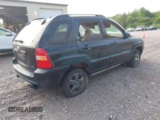 2006 Kia Sportage LX with VIN KNDJF723467183437, listed as a IAAI auction lot 42193429 with 186,114 mi miles and . Bid and sale history available at carsss.com. Image 4.