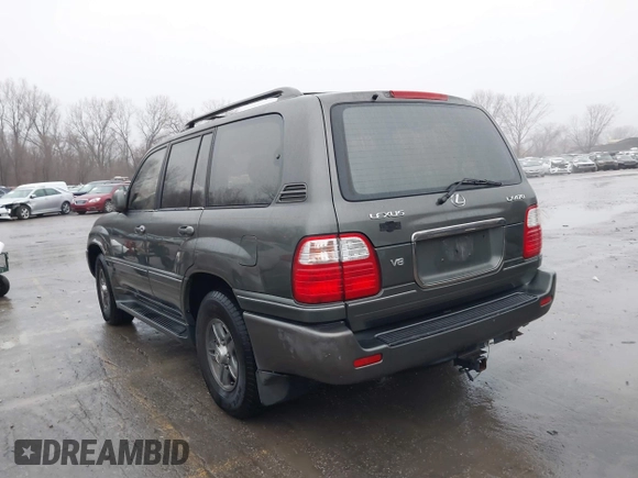 2002 Lexus LX 470 with VIN JTJHT00W923515897, listed as a IAAI auction lot 41155492 with 244,619 mi miles. Bid and sale history available at carsss.com. Image 3.