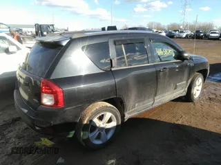 2011 Jeep Compass with VIN 1J4NF1FB8BD159017, listed as a IAAI auction lot 41658701 with 172,424 mi miles. Bid and sale history available at carsss.com. Image 4.