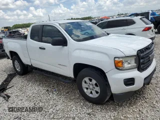 2015 GMC Canyon with VIN 1GTH51EA9F1263487, listed as a Copart auction lot 64905974 with 123,596 mi miles and Clean title. Bid and sale history available at DreamBid. Image 4.