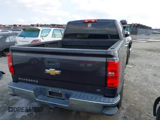 2014 Chevrolet Silverado 1500 LT with VIN 3GCPCREC7EG135069, listed as a IAAI auction lot 41999001 with 208,720 mi miles and . Bid and sale history available at DreamBid. Image 16.